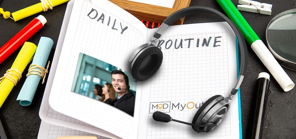 messy table with notebook and headset with written daily routine